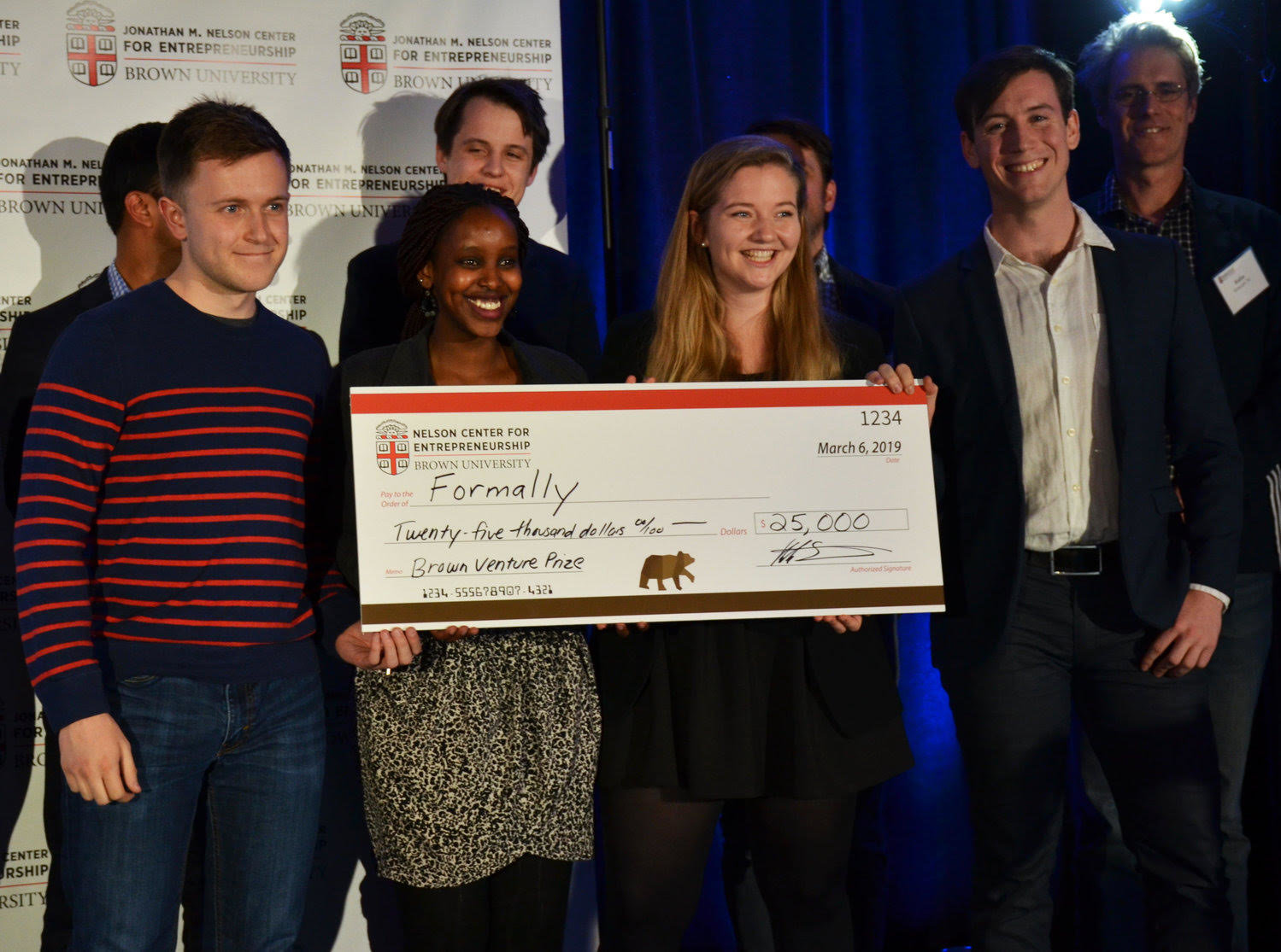 The winning team of Formally is awarded the 2019 Brown Venture Prize pitch night on March 6, 2019.